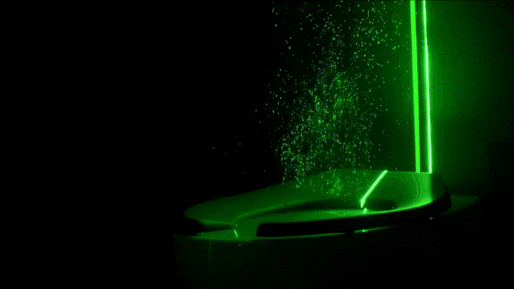Toilet aerosol bacteria spread visualized with laser